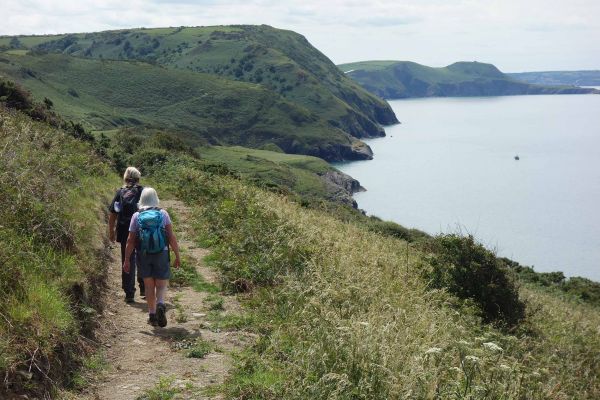 Walkers on the Cardigan coast line.