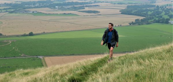 male walker on grassy Craig Rossie path