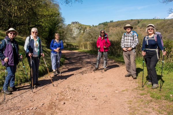 Walkers on a clay path in the countryside