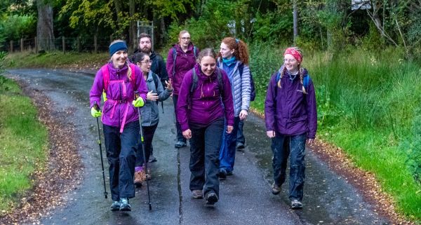 A group of young walkers on a country path