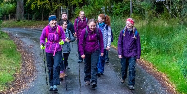 A group of young walkers on a country path