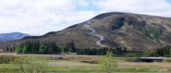 A track visibly winding up a hill