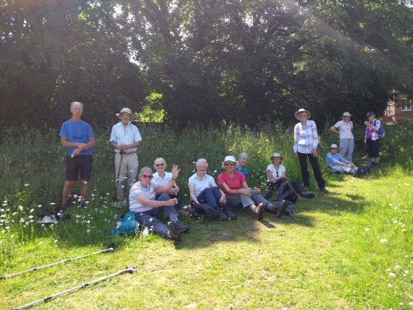 A group of ramblers enjoying a break in the countryside