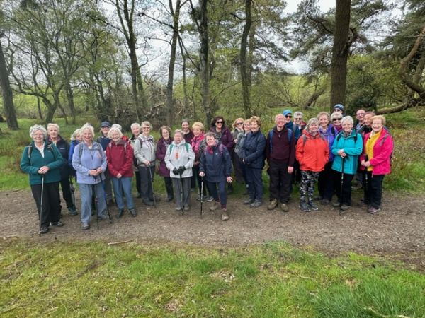 group photo on path with trees as backdrop