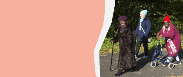 Three women walking with mobility aids. 